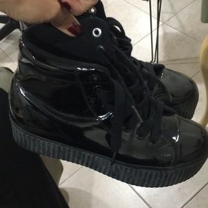 Black platform sneakers